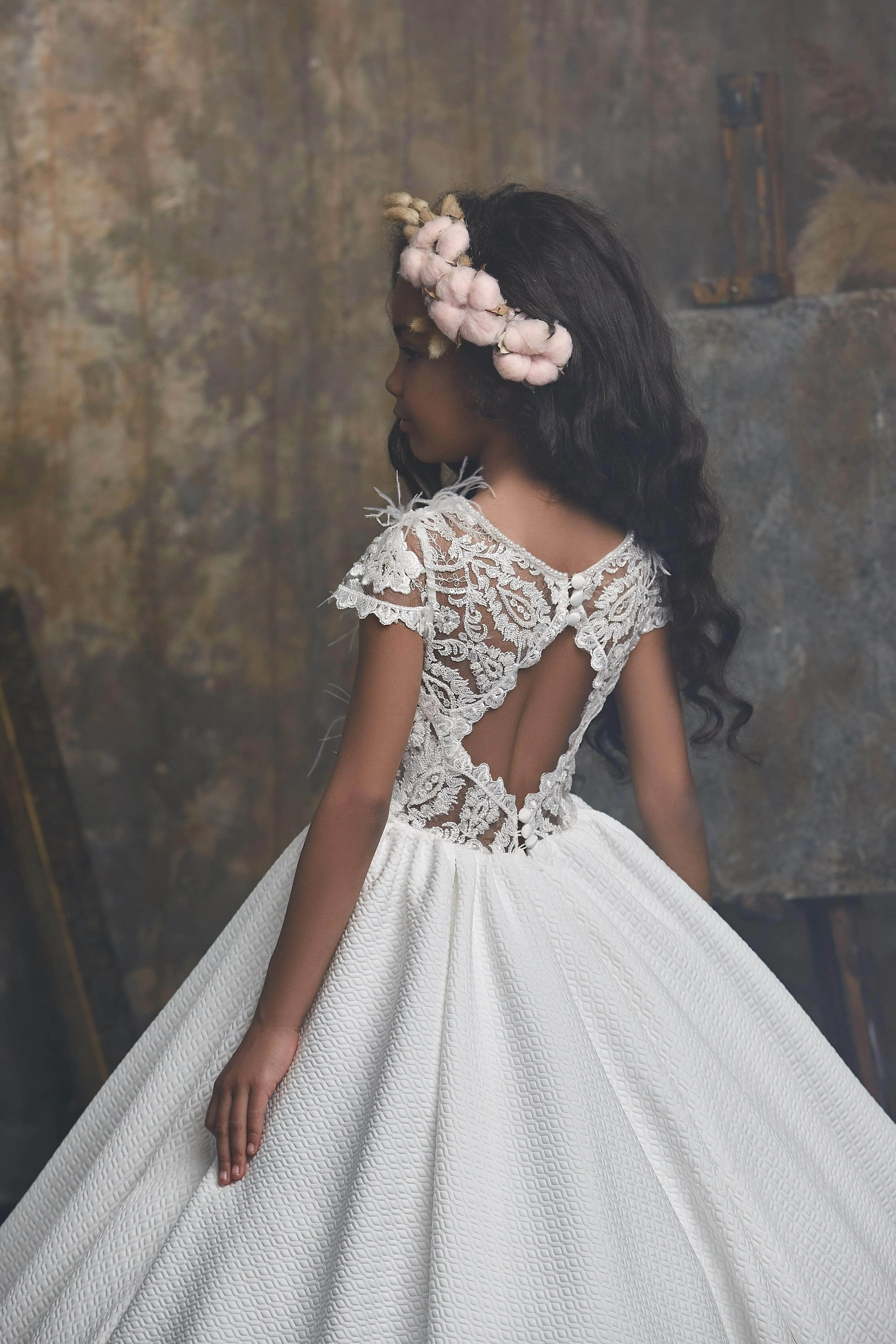 Girls White Crimplene Dress with Lace Sleeves and Feathers