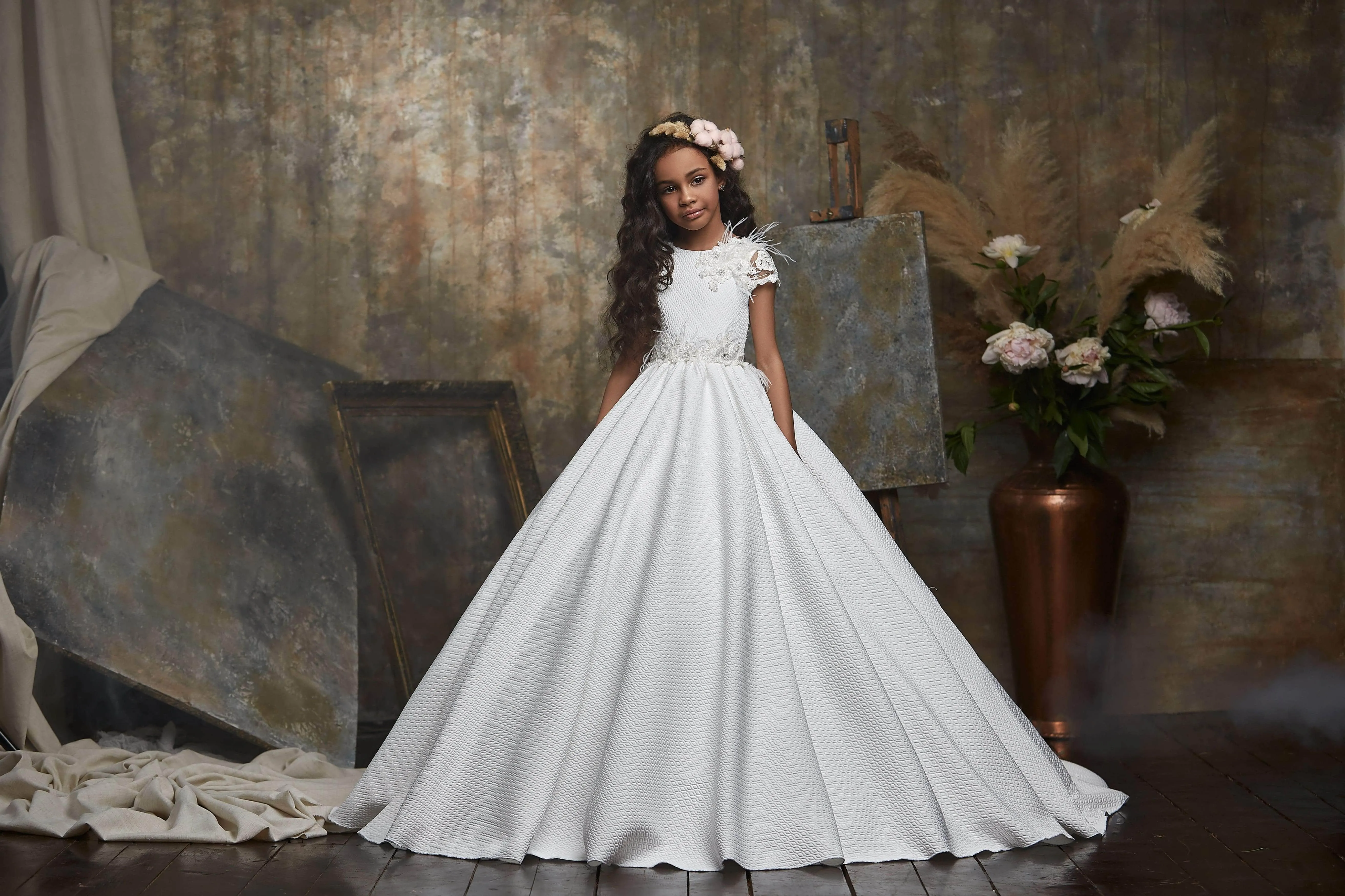 Girls White Crimplene Dress with Lace Sleeves and Feathers
