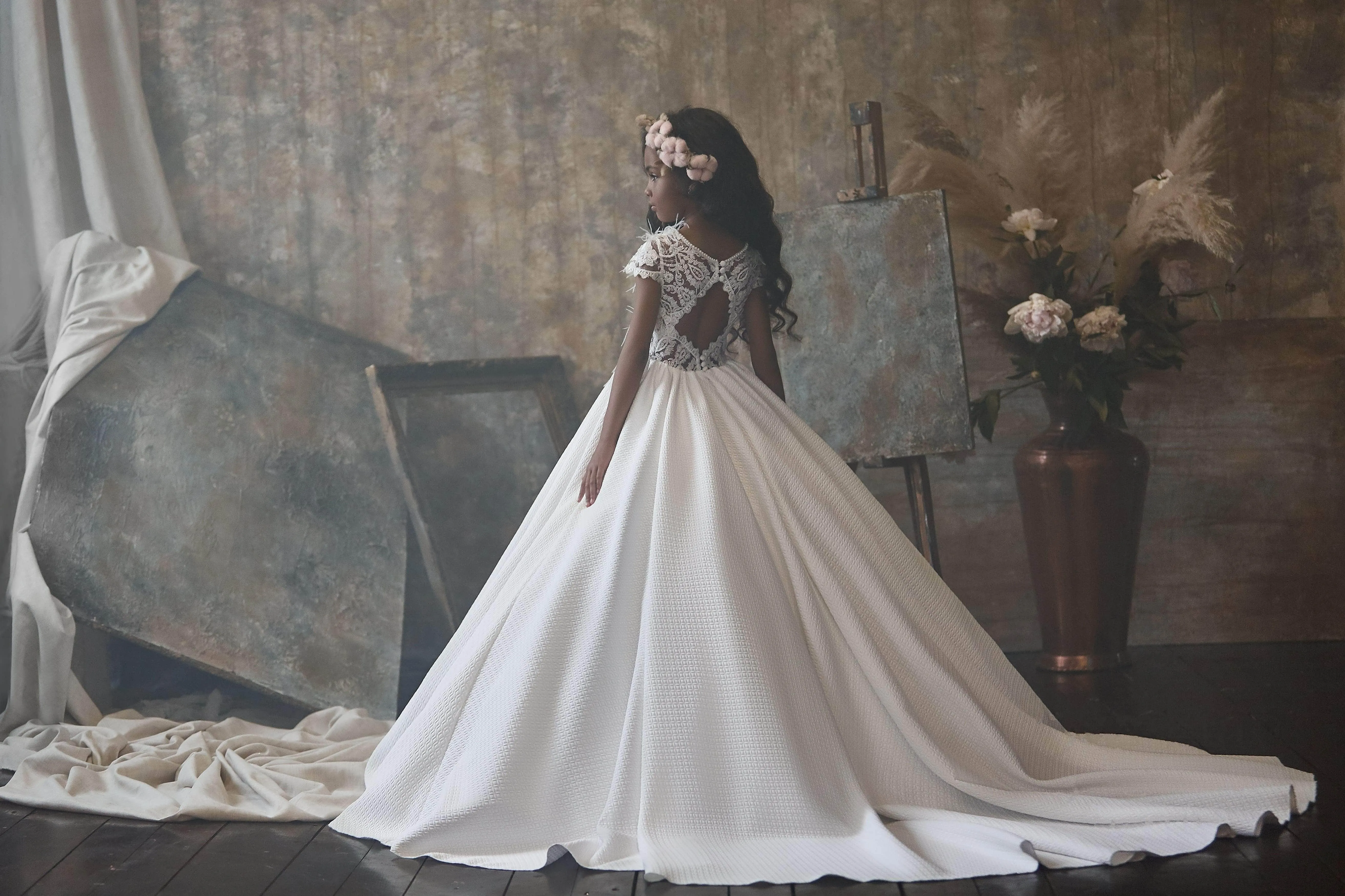 Girls White Crimplene Dress with Lace Sleeves and Feathers